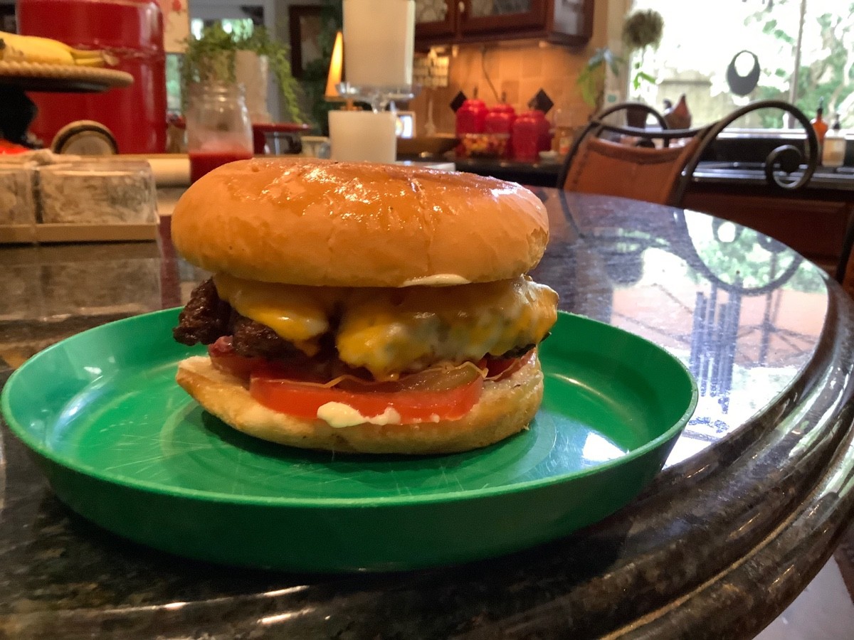 A good ol greasy, cast iron cheeseburger